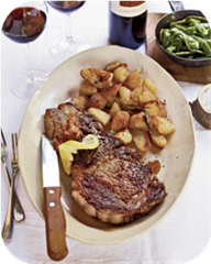Grilled Rib-Eye Steaks with Roasted Rosemary Potatoes
