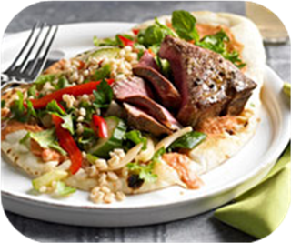 Lamb chops with barley salad and tomato dressing 
