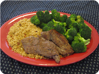 Broiled Flank Steak with Couscous, Broccoli and Garlic
