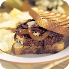 Chuckwagon goat cheese burgers with onion jam