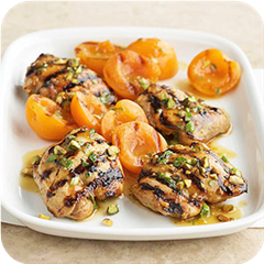 Golden grilled chicken thighs with apricots