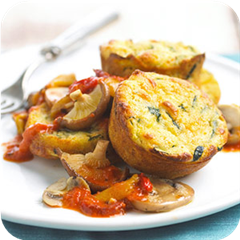 Zucchini cakes with mushroom ragout 