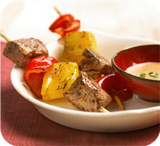 Pork skewers and peanut sauce 