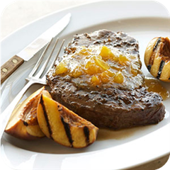 Peach-horseradish sauced ribeyes 