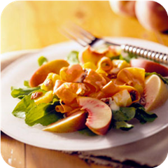 Carrot, fruit, and spinach salad 