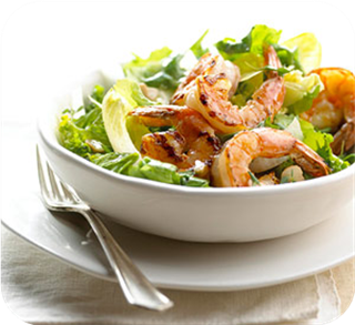 Shrimp on greens with garlic vinaigrette 