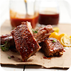 Smoked st. louis-style ribs with two sauces 