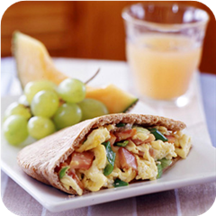 Eggs and canadian bacon in pita pockets 