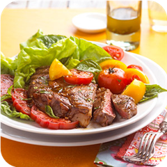 Ribeyes with garden tomatoes 