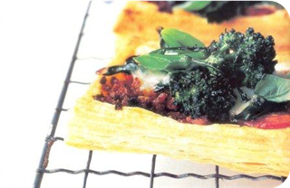Purple sprouting broccoli and sausage tarts