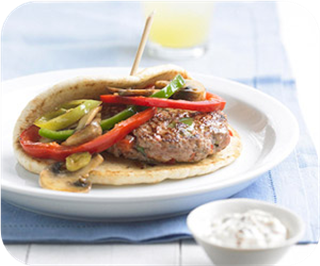 Pan-seared pork burgers with peppers and mushrooms 