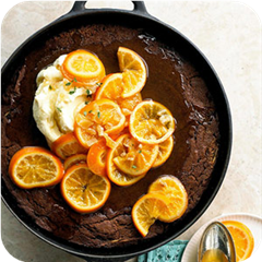 Chocolate gingerbread with simmered oranges 