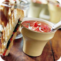 Smashed veggie-cheese sandwich and tomato soup 