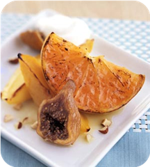 Orange-glazed fruit with anise whipped cream 