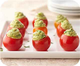 Avocado pesto-stuffed tomatoes 